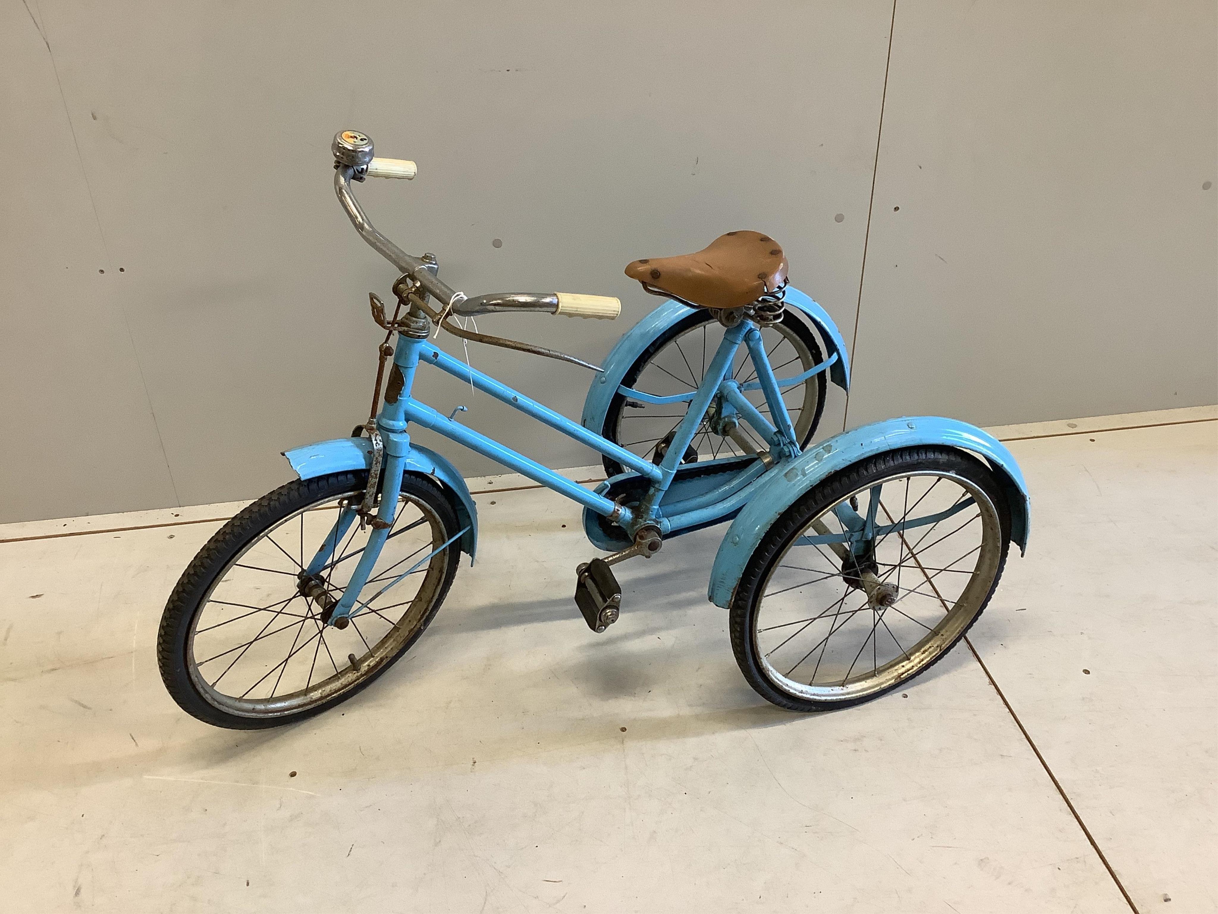 A vintage tricycle by Phillips Birmingham, length 110cm, height 73cm. Condition - fair